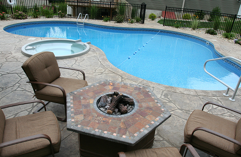 Swimming pool and stamped concrete project example 78